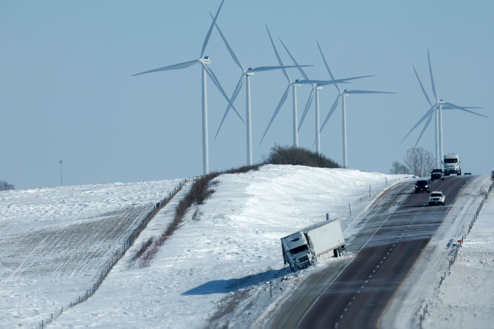 A wrecked tractor-trailer is seen on the eastbound side of Interstate 80 near Williamsburg, Iowa, on January 14.