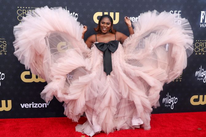 Danielle Brooks poses for photographers. 