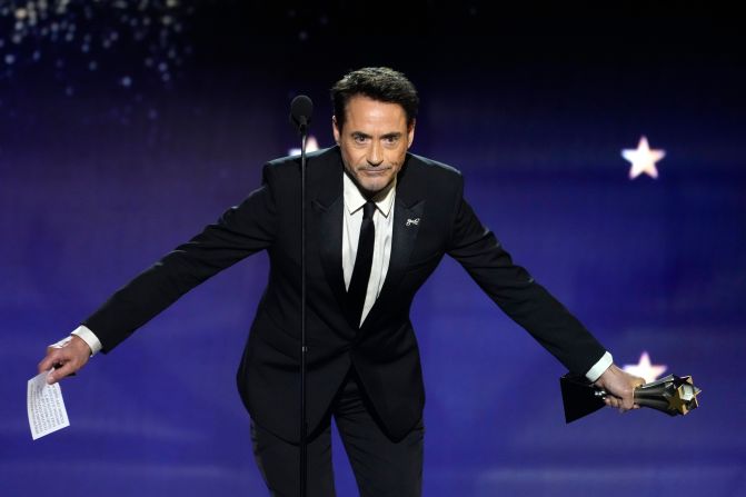 Robert Downey Jr. accepts the award for best supporting actor for "Oppenheimer."