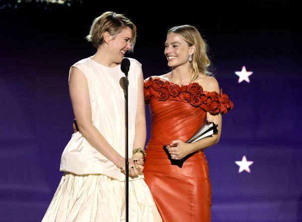 Greta Gerwig and Margot Robbie accept the best comedy award for "Barbie."