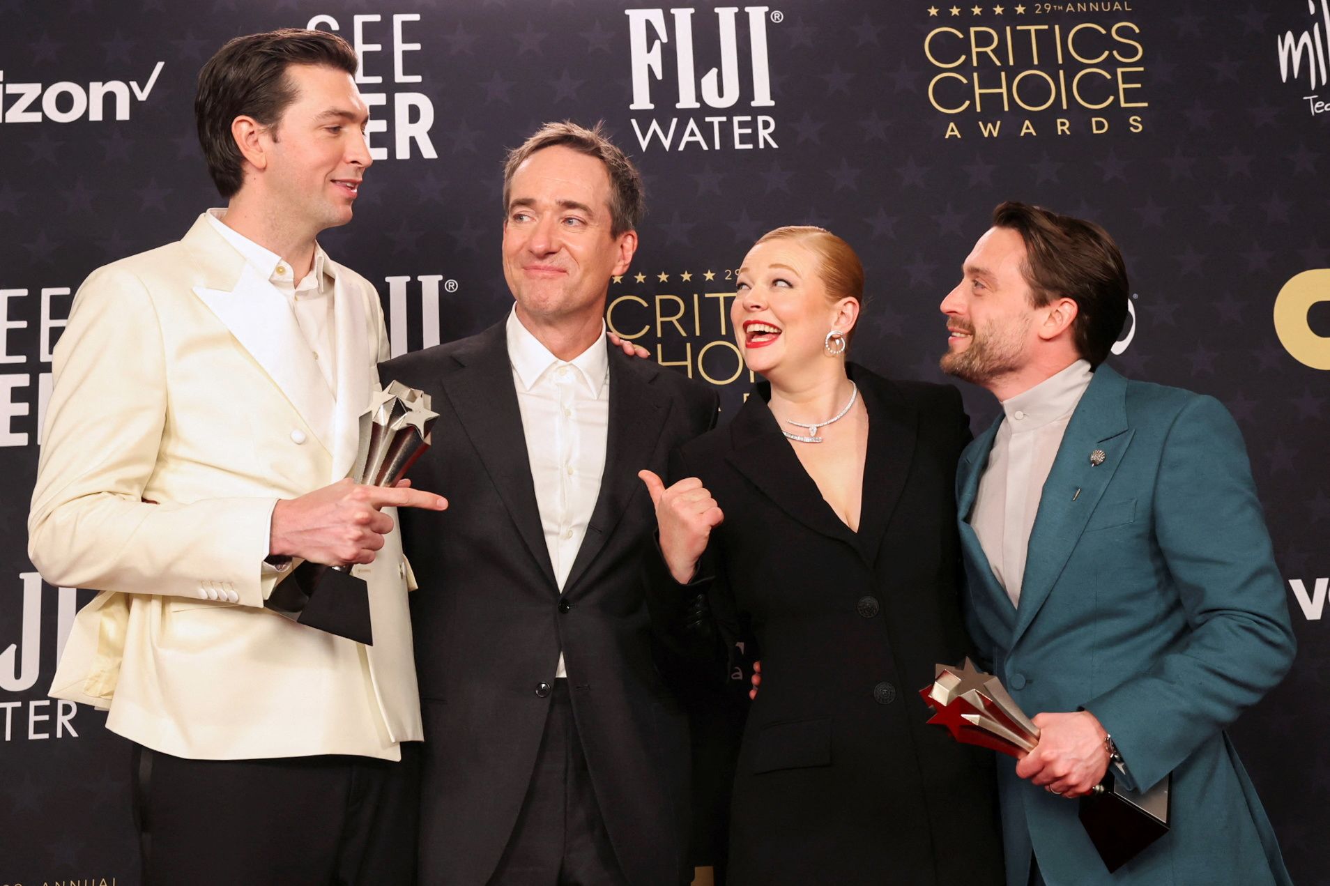 From left, Nicholas Braun, Matthew Macfadyen, Sarah Snook and Kieran Culkin pose with the awards for best drama series for "Succession."