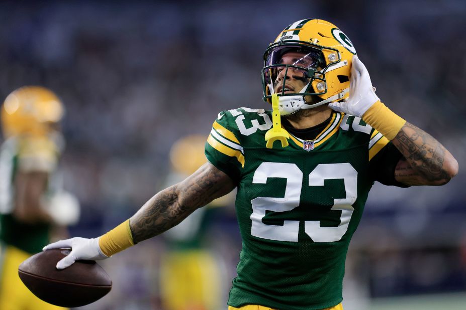 Green Bay Packers cornerback Jaire Alexander celebrates making an interception during the first quarter of the Packers' game against the Dallas Cowboys on January 14 in Arlington, Texas. <a href=