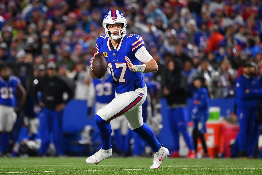 ORCHARD PARK, NEW YORK - DECEMBER 17: Josh Allen #17 of the Buffalo Bills attempts a pass during the first half against the Dallas Cowboys at Highmark Stadium on December 17, 2023 in Orchard Park, New York. (Photo by Rich Barnes/Getty Images)