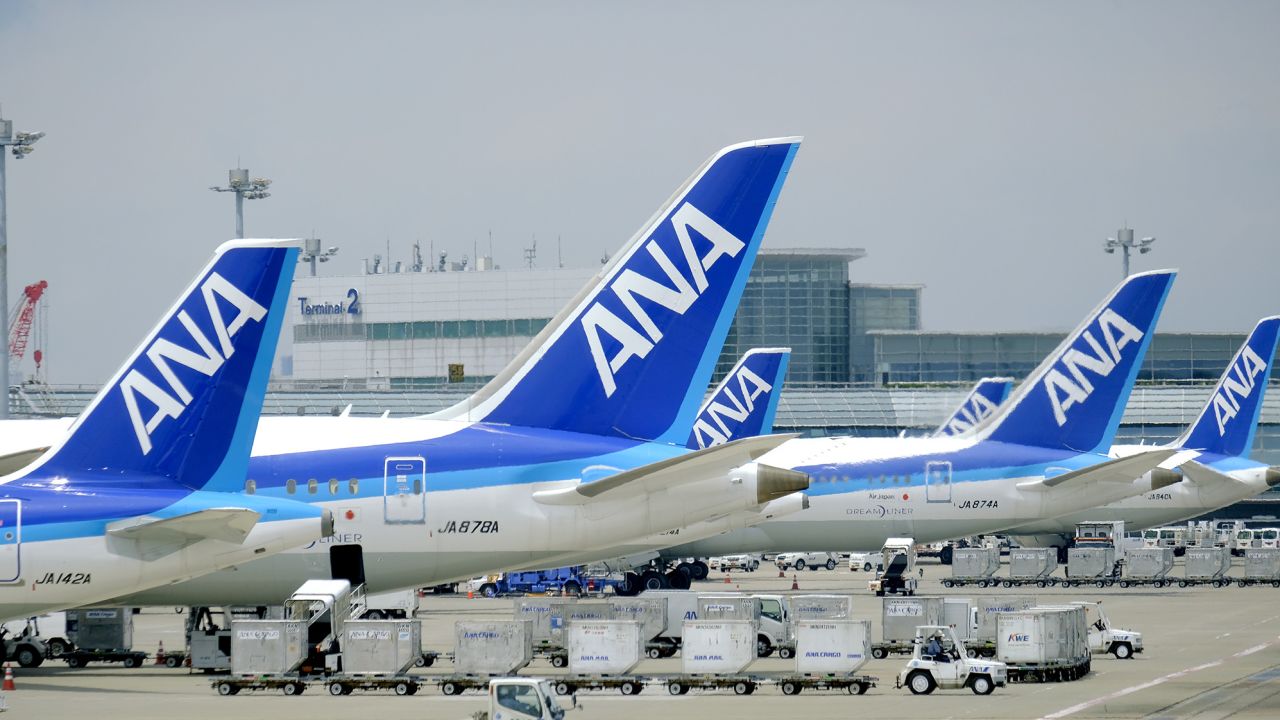 TOKYO, JAPAN - 2021/11/29: All Nippon Airways (ANA) airplanes seen at the Tokyo International Airport, commonly known as Haneda Airport in Tokyo. (Photo by James Matsumoto/SOPA Images/LightRocket via Getty Images)