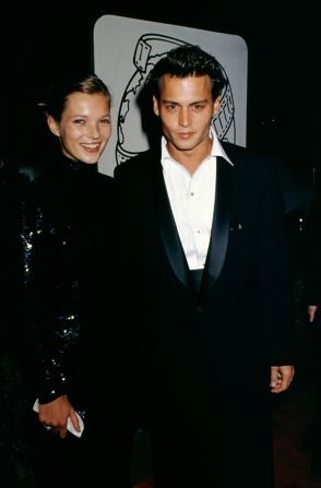 Kate Moss and her then-boyfriend, the actor Johnny Depp, attend the Golden Globe Awards in 1995.