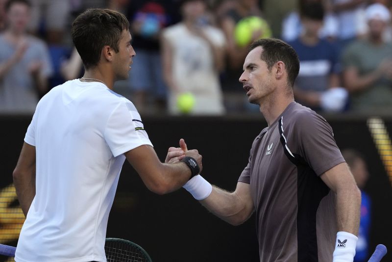 Murray (right) and Etcheverry shake hands after the Argentinan beat Murray at the Australian Open.