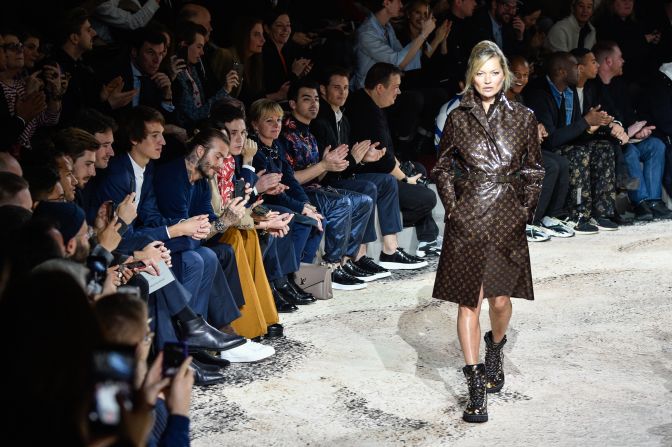 Moss walks the runway during Louis Vuitton's Fall-Winter menswear 2018 show in Paris.