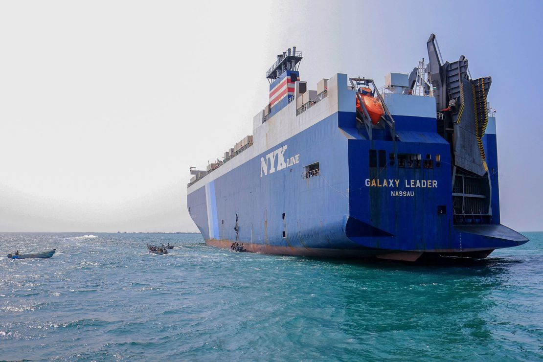 A picture taken during an organised tour by Yemen's Huthi rebels on November 22, 2023 shows the Galaxy Leader cargo ship, seized by Huthi fighters two days earlier, at a port on the Red Sea in Yemen's province of Hodeida. The Bahamas-flagged, British-owned Galaxy Leader, operated by a Japanese firm but having links to an Israeli businessman, was headed from Turkey to India when it was seized and re-routed to Hodeida November 19, according to maritime security company Ambrey. The Huthis said the capture was in retaliation for Israel's war against Hamas, sparked by the October 7 attack by the Palestinian militants who killed 1,200 people and took around 240 hostages, according to Israeli officials. (Photo by AFP) (Photo by -/AFP via Getty Images)
