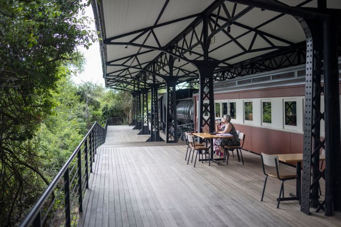 The company behind the hotel also operates the nearby Kruger Station, home to a steam locomotive lovingly preserved with period features, but totally isolated since the train tracks leading out of the station were removed decades ago. "The culture of steam trains and the culture of historical trains I think is beginning to re-emerge," says Mabena. "We don't have a moving steam train, but one day, I think we will."
