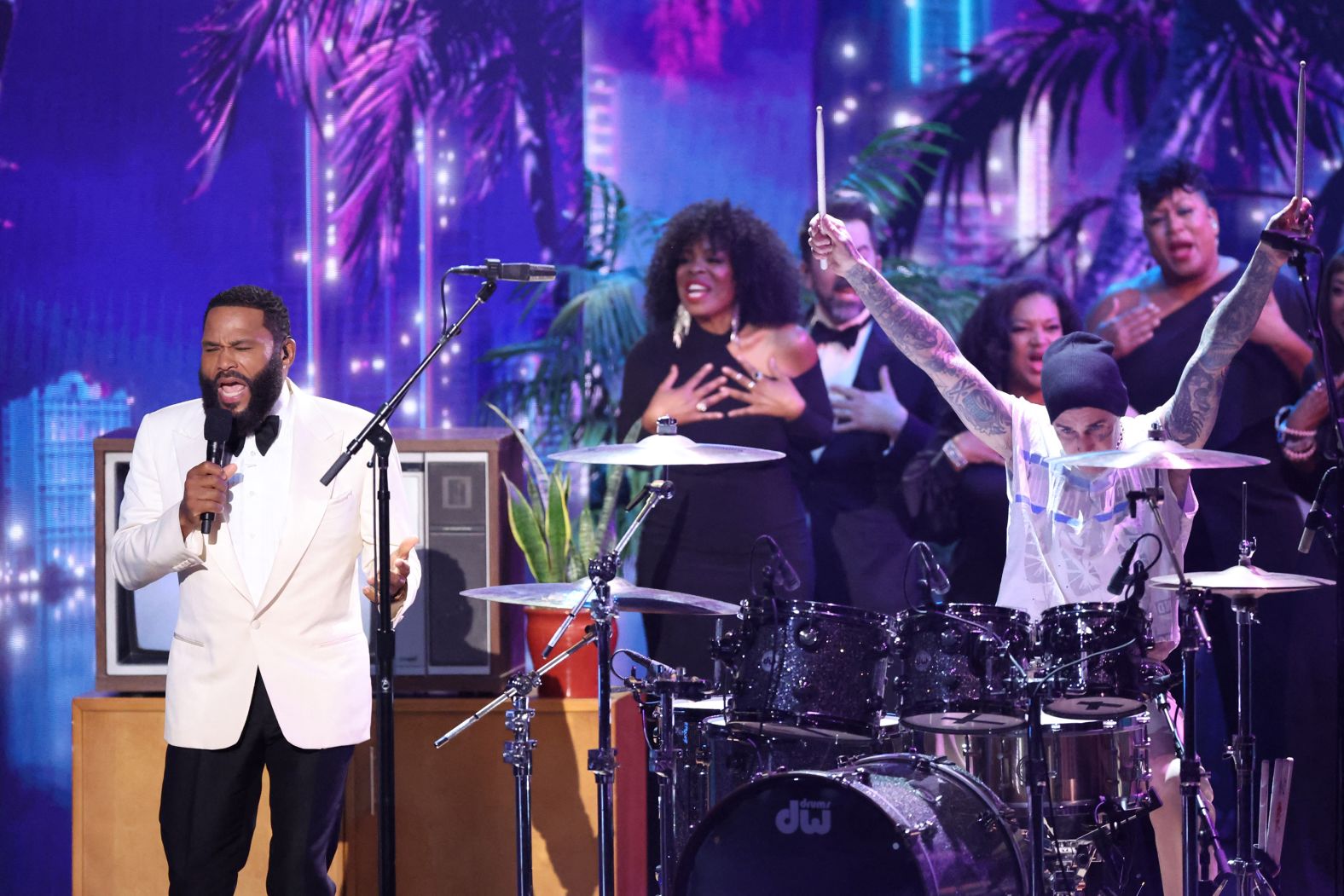 Anderson opens the show alongside drummer Travis Barker.