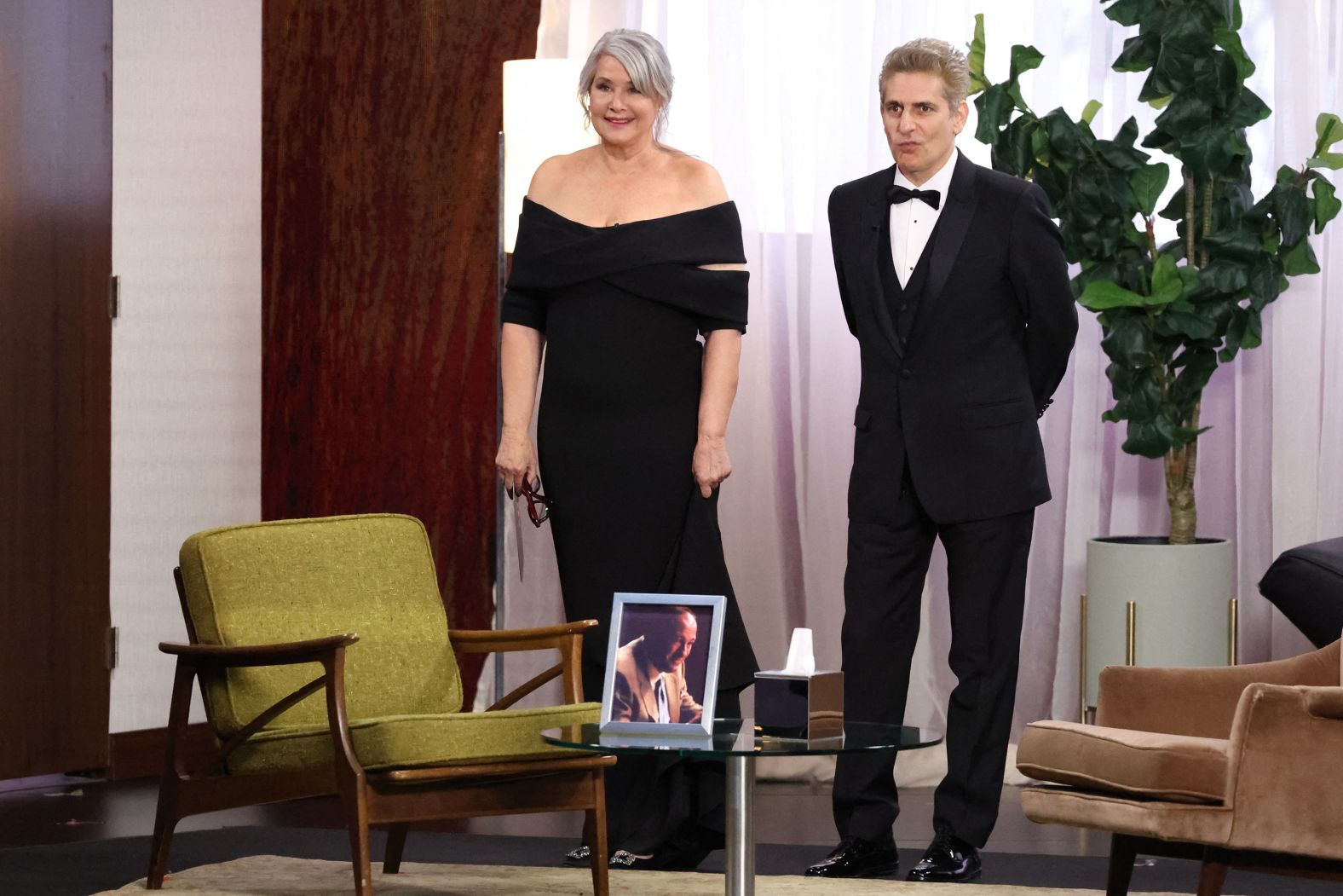 "Sopranos" castmates Lorraine Bracco and Michael Imperioli reunite to present an award during the first hour of the show. Late actor James Gandolfini can be seen on the photo in front of them.