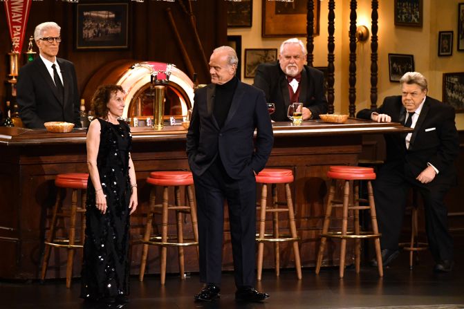 The cast of "Cheers" — from left, Ted Danson, Rhea Perlman, Kelsey Grammer, John Ratzenberger and George Wendt — present a couple of awards during the show.