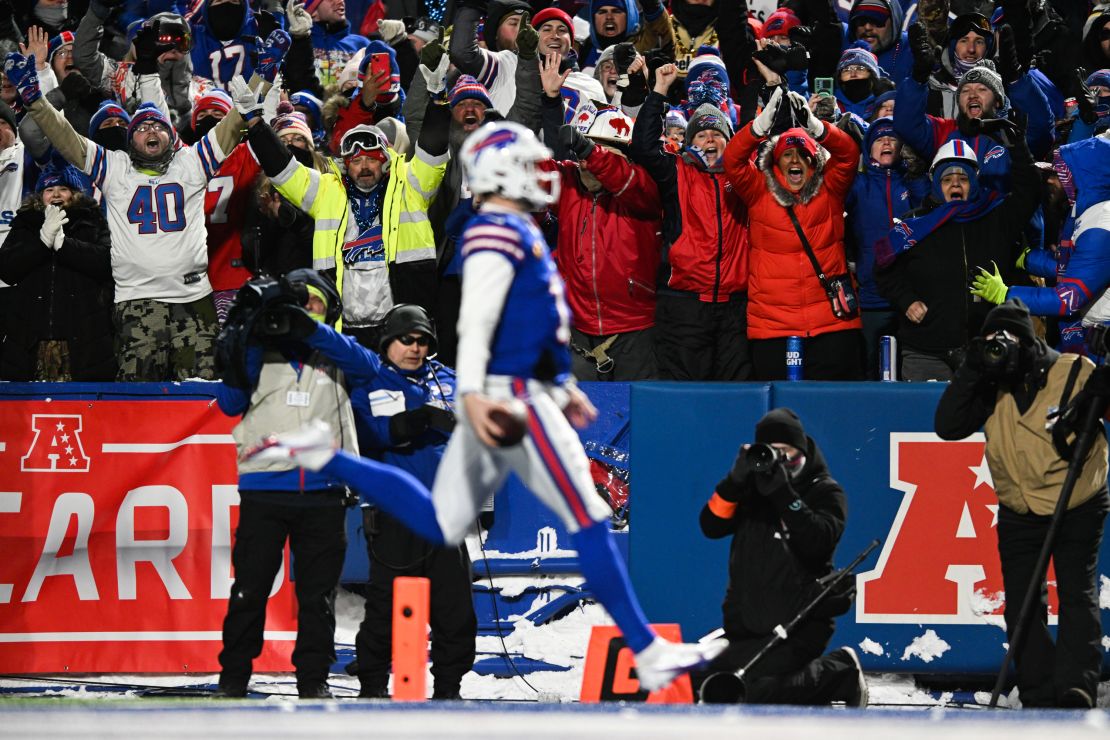ORCHARD PARK, NY - JANUARY 15: Fans react as Josh Allen #17 of the Buffalo Bills scores a touchdown during the first half of the NFL wild-card playoff football game against the Pittsburgh Steelers at Highmark Stadium on January 15, 2024 in Orchard Park, New York. (Photo by Kathryn Riley/Getty Images)