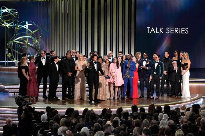 Trevor Noah and the rest of "The Daily Show" team accept the Emmy for outstanding talk series.
