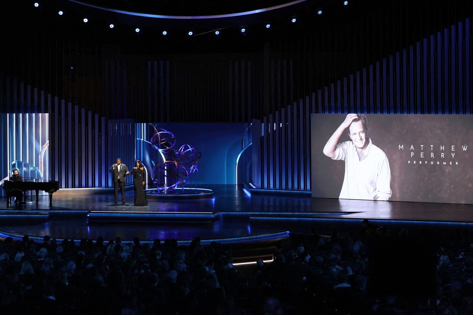 Michael Trotter Jr. and Tanya Trotter, the husband-and-wife duo The War And Treaty, perform the In Memoriam segment with Charlie Puth.