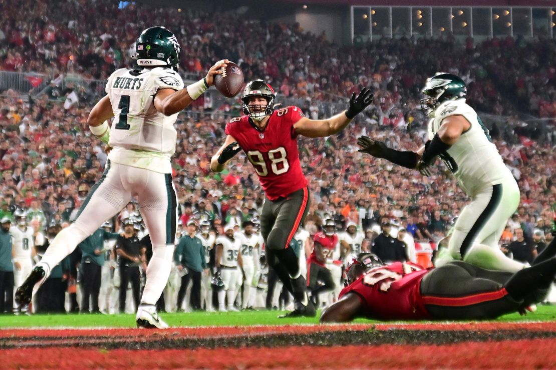 TAMPA, FLORIDA - JANUARY 15: Jalen Hurts #1 of the Philadelphia Eagles throws the ball for an intentional grounding that led to a safety against the Tampa Bay Buccaneers during the third quarter in the NFC Wild Card Playoffs at Raymond James Stadium on January 15, 2024 in Tampa, Florida. (Photo by Julio Aguilar/Getty Images)
