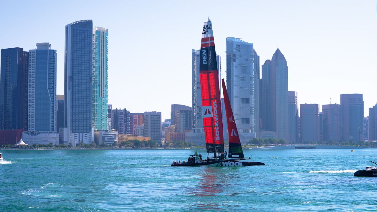 SailGP's F50 catamarans on the water in front of the Abu Dhabi skyline