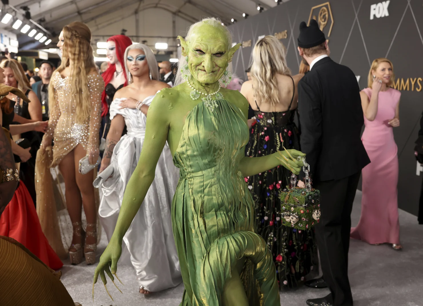 Look of the Week: The Reason Behind This Green Troll’s Shocking Emmys Ensemble 