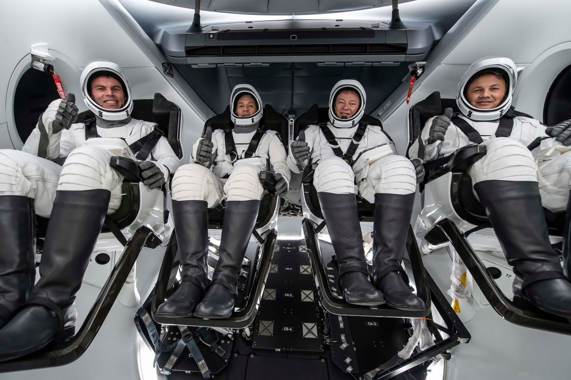 The Aximo-3 crew is pictured during training for their mission.