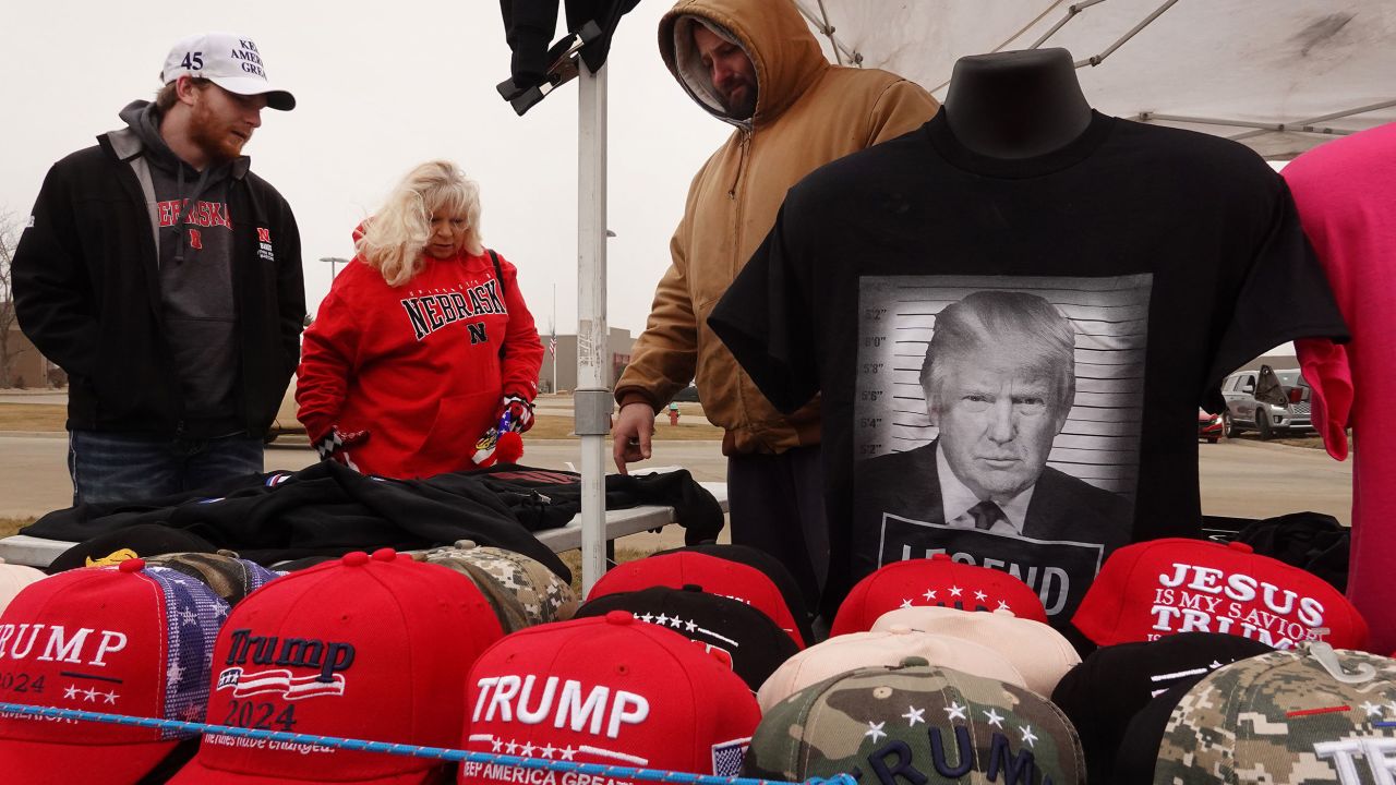 SIOUX CENTER, IOWA - JANUARY 05: Vendors sell campaign merchandise outside of a rally with Republican presidential candidate former President Donald Trump on January 05, 2024 in Sioux Center, Iowa. Iowa Republicans will be the first to select their party's nomination for the 2024 presidential race when they go to caucus on January 15, 2024.  (Photo by Scott Olson/Getty Images)