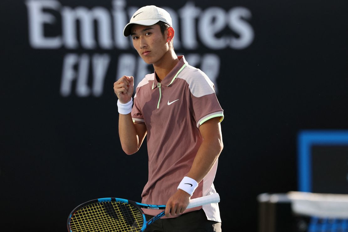 China's Shang Juncheng reacts after a point against USA's Mackenzie McDonald during their men's singles match on day three of the Australian Open tennis tournament in Melbourne on January 16, 2024. (Photo by David GRAY / AFP) / -- IMAGE RESTRICTED TO EDITORIAL USE - STRICTLY NO COMMERCIAL USE -- (Photo by DAVID GRAY/AFP via Getty Images)