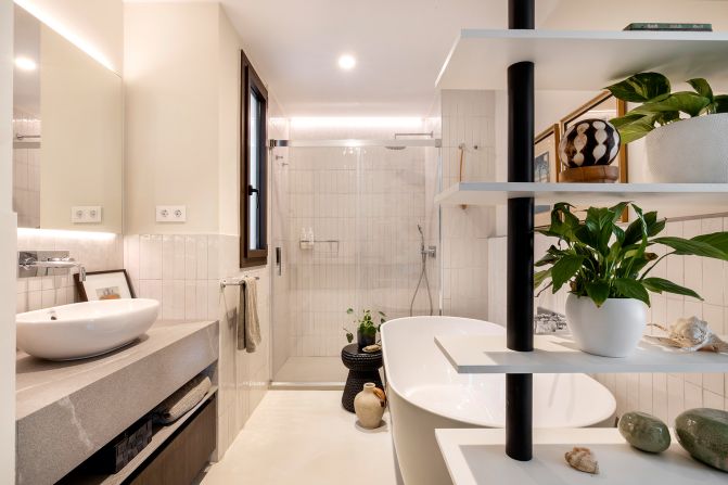 <strong>Luxury bath: </strong>A spacious bathroom with a tub and walk-in shower is part of his renovations.