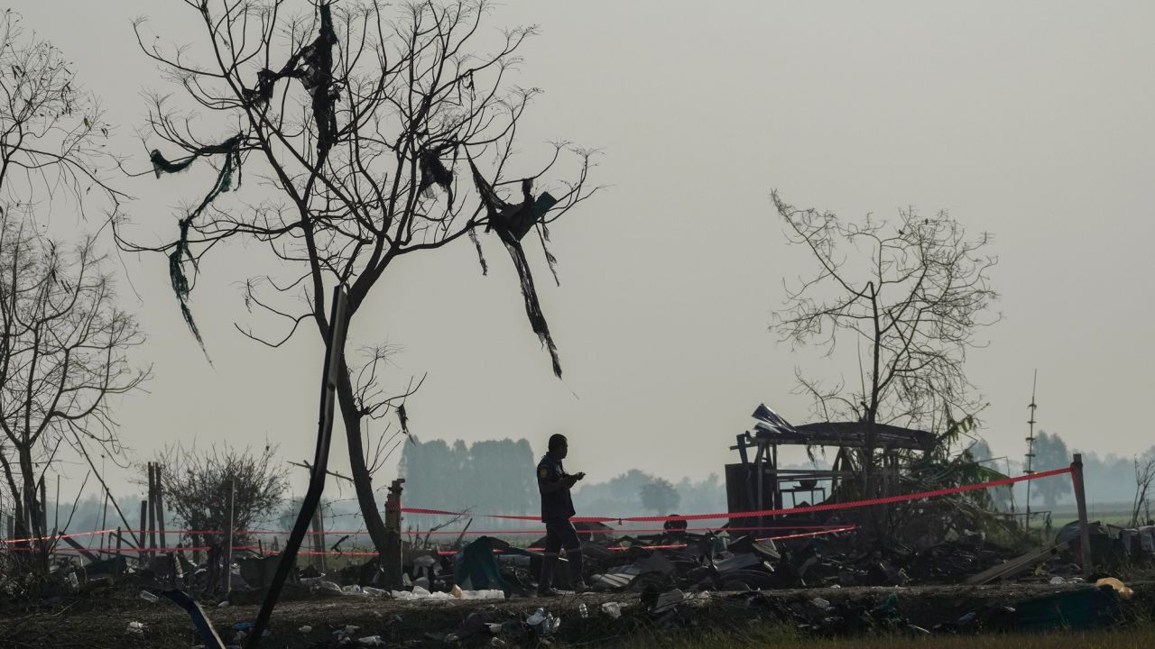 A Thai rescue member walks at the scene of an explosion at a firework factory in Suphan Buri province, Thailand, Thursday, Jan. 18, 2024. The blast in central Thailand killed multiple people on Wednesday, according to provincial officials. The devastation at the scene has made the death toll uncertain. (AP Photo/Sakchai Lalit)