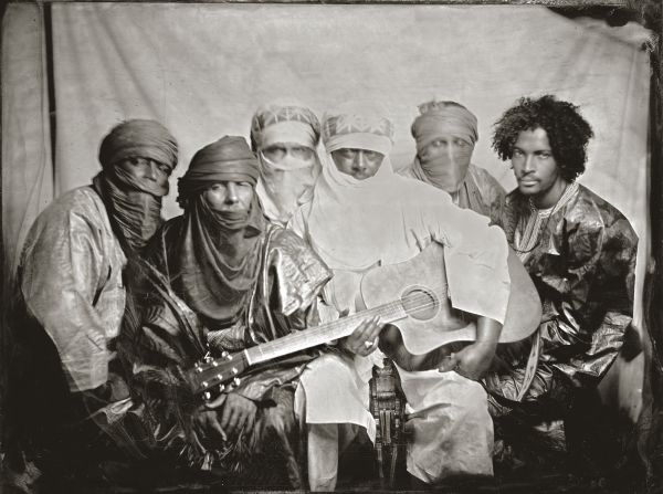 In 2012, at the 54th Grammys, the band known as Tinariwen won the award for World Music Album. Pictured here posing for a photo before a 2014 concert in Berlin, Germany, the group of <a target="_blank" target="_blank">Tuareg</a> (a traditionally nomadic people in the Sahara) musicians is comprised of members hailing from Mali, Algeria and Libya.