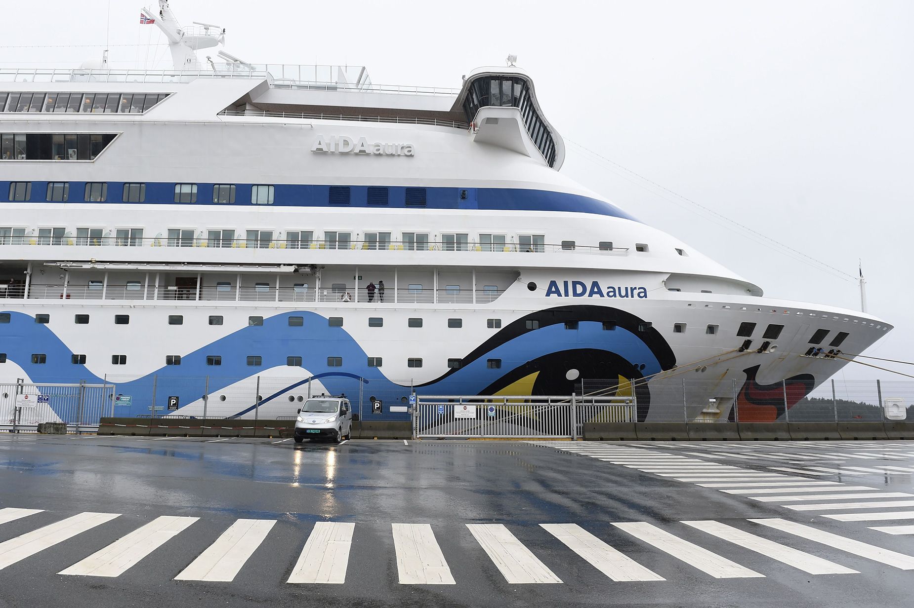 The German cruise ship Aida Aura is pictured on March 3, 2020 at the quay in Haugesund, Norway, pending the answer, whether two quarantineed passengers have been infected with the coronavirus. - Two passengers on board the ship have shown symptoms of corona infection and the ship on March 2, 2020 has posponed its departure from Haugesund, Norway, while waiting for the results of medical tests. (Photo by Marit Hommedal / NTB Scanpix / AFP) / Norway OUT (Photo by MARIT HOMMEDAL/NTB Scanpix/AFP via Getty Images)