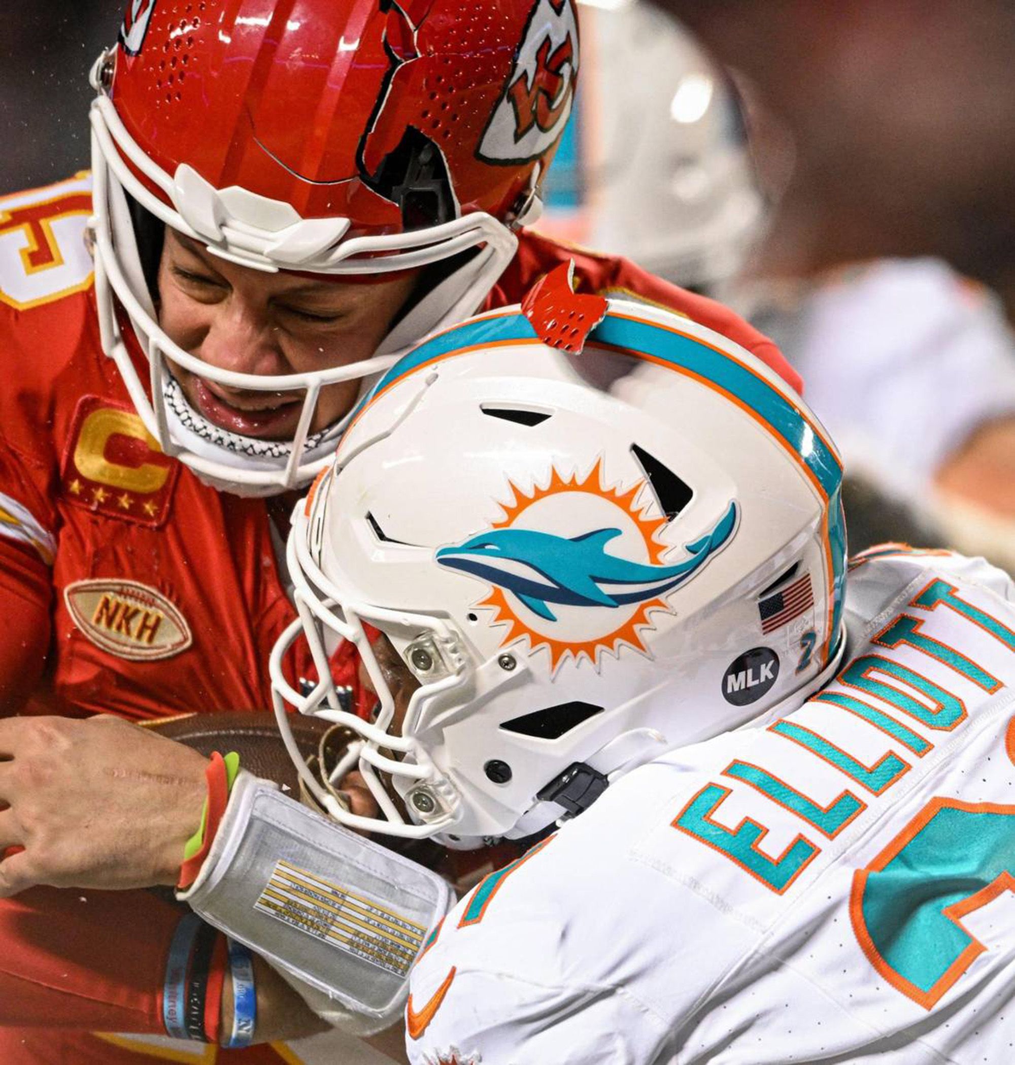 The helmet of Kansas City Chiefs quarterback Patrick Mahomes breaks as he is hit by Miami Dolphins safety DeShon Elliott during the Chiefs' 26-7 victory.