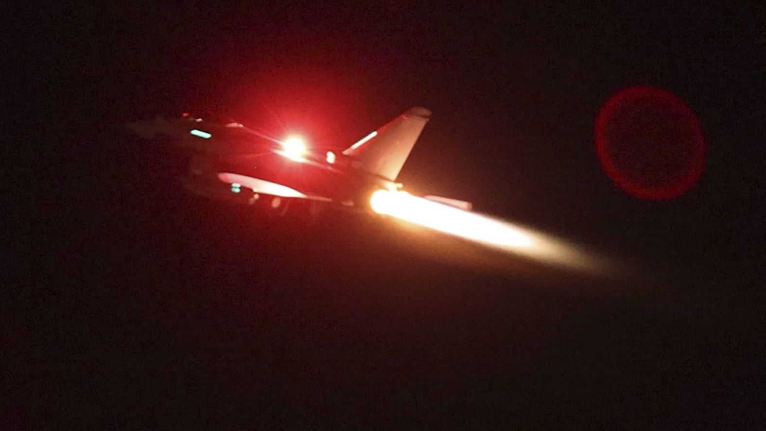 A Royal Air Force Typhoon aircraft takes off from RAF Akrotiri in Cyprus on a mission to strike targets in Yemen on Thursday, January 11. The US and UK militaries <a href="index.php?page=&url=https%3A%2F%2Fwww.cnn.com%2F2023%2F12%2F19%2Fmiddleeast%2Fred-sea-crisis-explainer-houthi-yemen-israel-intl%2Findex.html" target="_blank">launched multiple strikes</a> against targets in Houthi-controlled areas of Yemen, marking a significant response after the Biden administration and its allies warned that the Iran-backed militant group would <a href="index.php?page=&url=https%3A%2F%2Fwww.cnn.com%2F2024%2F01%2F10%2Fpolitics%2Fus-houthi-attacks-red-sea%2Findex.html" target="_blank">bear the consequences</a> of its attacks on commercial shipping in the Red Sea.