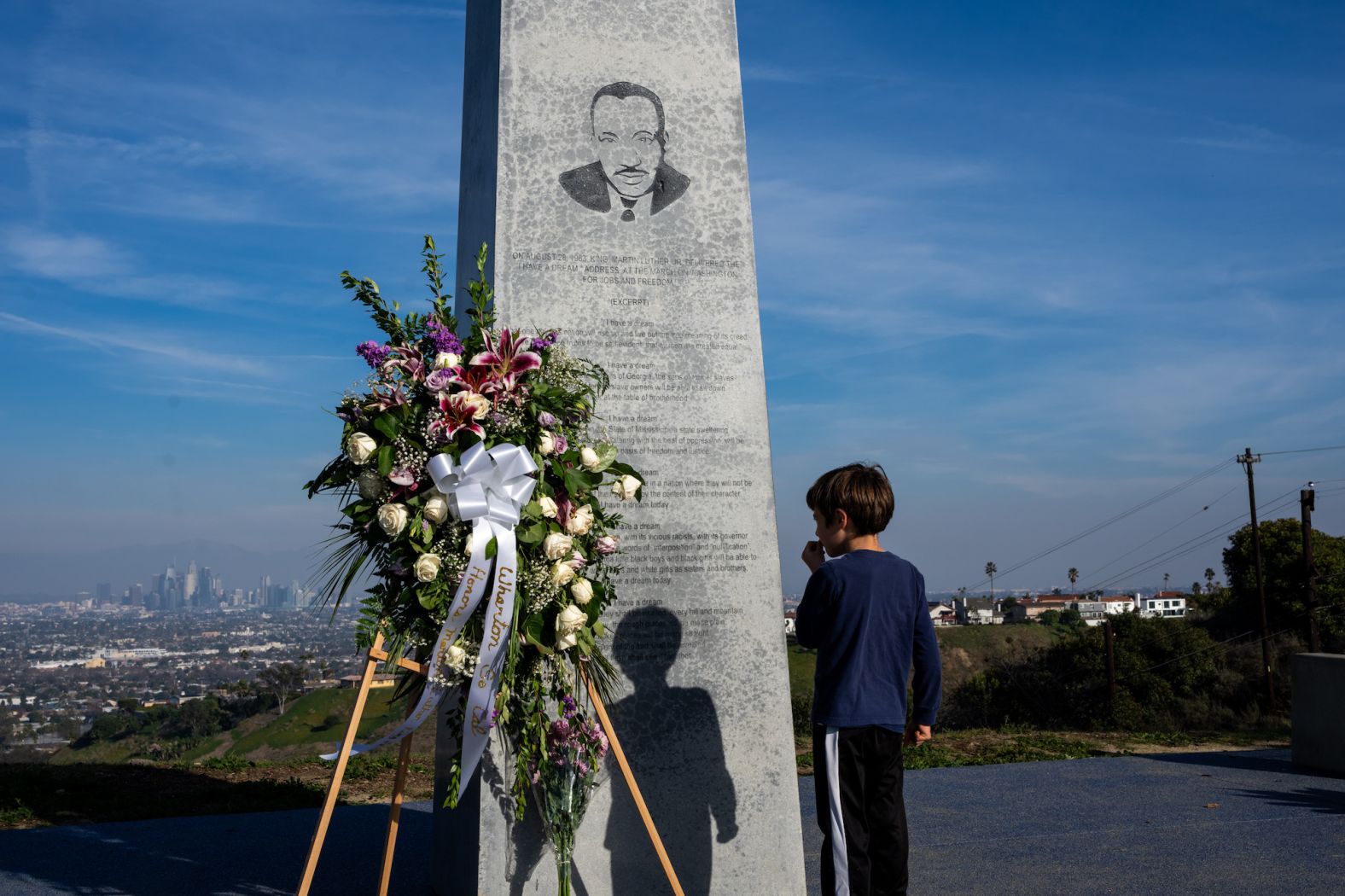 A child visits the Martin Luther King Jr. Memorial in Los Angeles' Kenneth Hahn State Recreational Area on Monday, January 15.