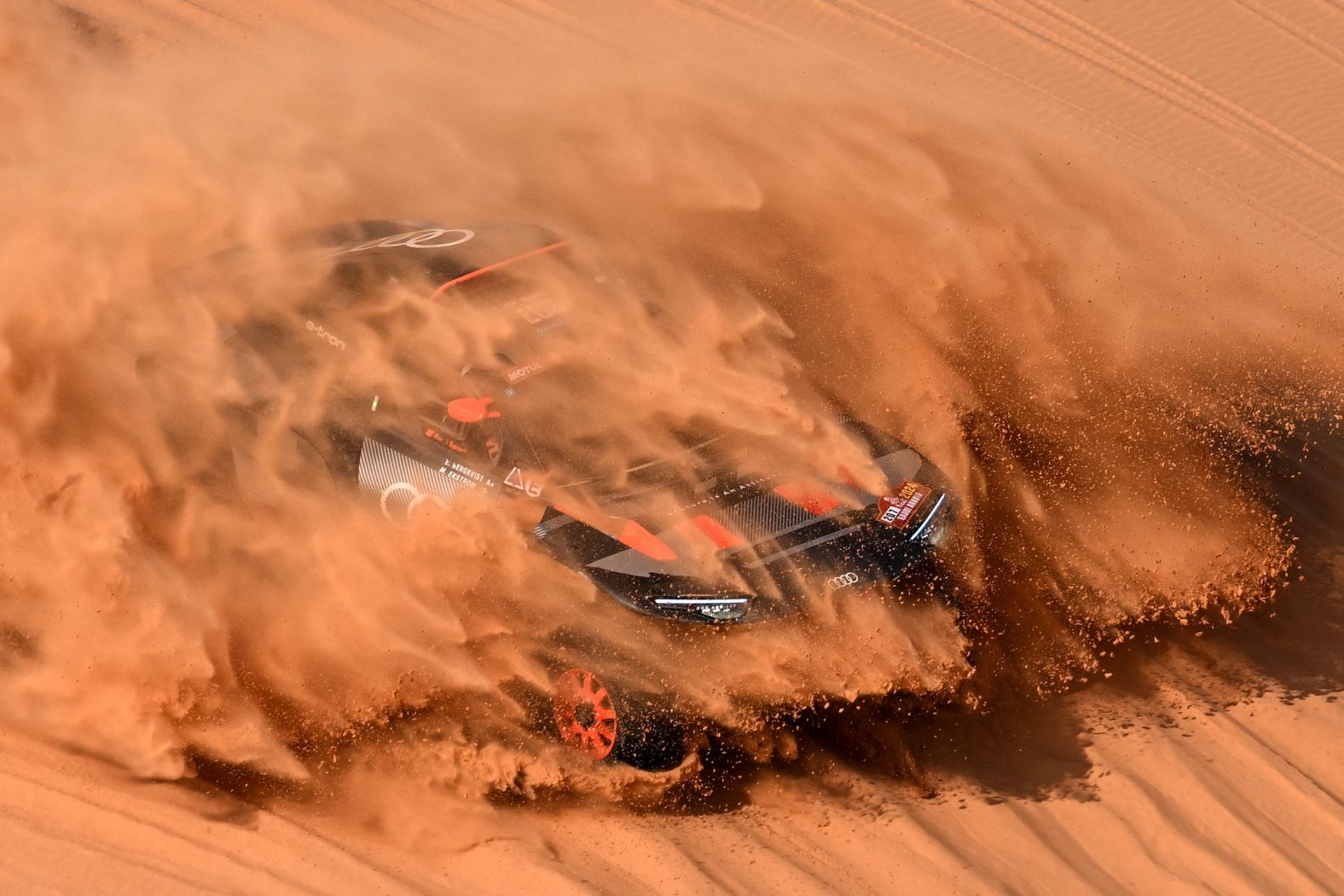 Team Audi Sport's Swedish driver Mattias Ekstrom and co-driver Emil Bergkvist steer their car in the dunes during the Dakar Rally in Saudi Arabia on Monday, January 15.