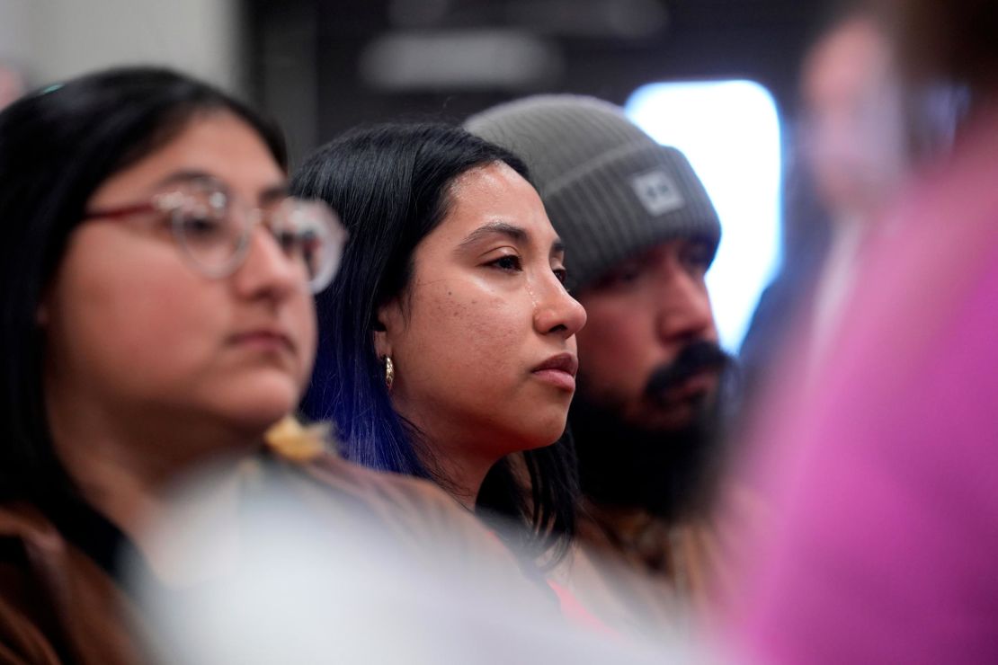 Jazmin Cazares, left, Kimberly Mata-Rubio, center, and other family members of shooting victims listen to Attorney General Merrick B. Garland and Associate Attorney General Vanita Gupta during a news conference were they shared the findings of a federal report into the law enforcement response to a school shooting at Robb Elementary, Thursday, Jan. 18, 2024, in Uvalde, Texas. (AP Photo/Eric Gay)