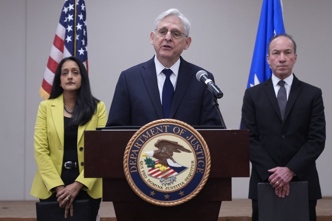Attorney General Merrick B. Garland, center, with Associate Attorney General Vanita Gupta, left, and COPS Director Hugh Clements, Jr., right, speaks during a news conference were they shared the findings of a federal report into the law enforcement response to a school shooting at Robb Elementary, Thursday, Jan. 18, 2024, in Uvalde, Texas. (AP Photo/Eric Gay)