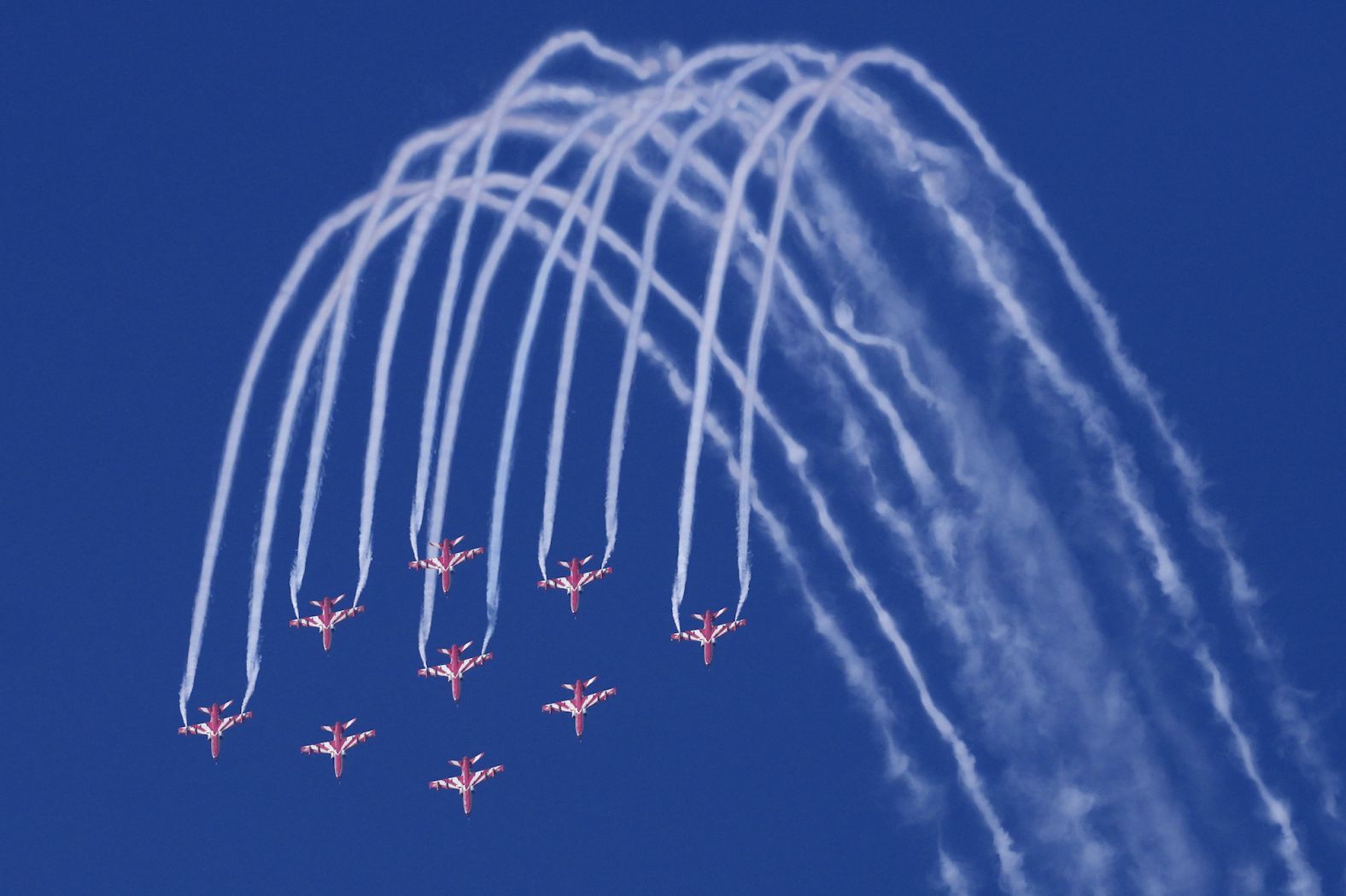 The Indian Air Force Surya Kiran aerobatics team rehearses for an air show in Mumbai, India, on Friday, January 12.