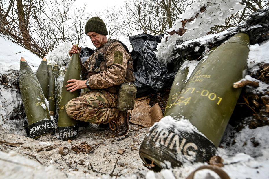 A Ukrainian serviceman prepares artillery shells at a position near the front line in Ukraine's Zaporizhzhia region on Sunday, January 14.