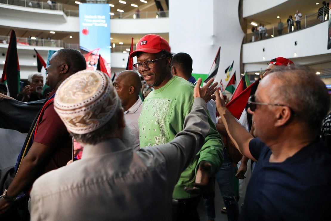 Advocate Tembeka Ngcukaitobi (C), a member of the South African legal team is greeted by a supporter, after landing back in the country from representing the country in a two-day hearing against Isreal at the International Court of Justice (ICJ), at the OR Tambo International Airport in Ekurhuleni, South Africa, on January 14, 2024. South Africa on January 11, 2024 accused Israel of breaching the UN Genocide Convention, saying that even the deadly October 7 Hamas attack could not justify such alleged actions, as it opened a case at the top UN court.
Pretoria has lodged an urgent appeal to the International Court of Justice (ICJ) to force Israel to "immediately suspend" its military operations in Gaza. (Photo by Alaister Russell / AFP) (Photo by ALAISTER RUSSELL/AFP via Getty Images)