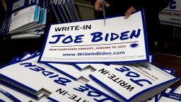 As part of a school internship, a political science student from St. Olaf College in Minnesota assembles a sign promoting the write-in campaign to put U.S. President Joe Biden's name on the New Hampshire Democratic primary ballot, at the New Hampshire AFL-CIO office in Hooksett, New Hampshire, U.S., January 15, 2024.