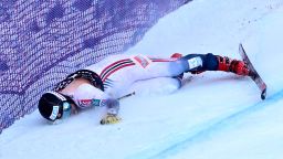 TOPSHOT - Norway's Aleksander Aamodt Kilde lies on the snow after crashing during the Downhill of the FIS Alpine Skiing Men's World Cup event in Wengen on January 13, 2024. (Photo by Marco BERTORELLO / AFP) (Photo by MARCO BERTORELLO/AFP via Getty Images)