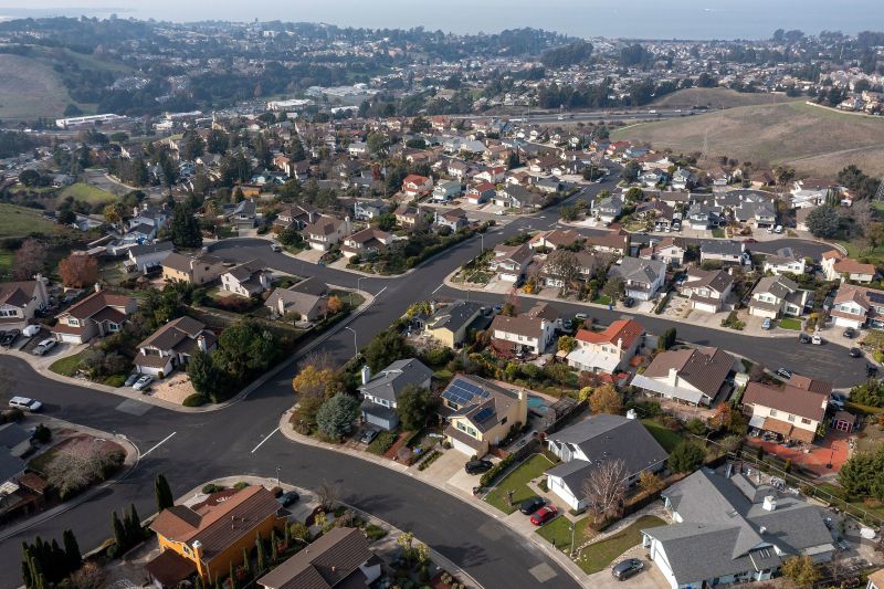 Homes in Pinole, California, US, on Tuesday, Dec. 26, 2023. Sales of previously owned US homes unexpectedly rose in November, led by a pickup in the South and representing a respite in a two-year downturn caused by higher borrowing costs and a lack of inventory. Photographer: David Paul Morris/Bloomberg via Getty Images