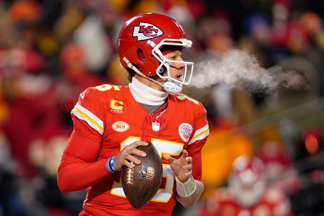 Kansas City Chiefs quarterback Patrick Mahomes (15) drops back to pass against the Miami Dolphins during the first half of the 2024 AFC wild card game at GEHA Field at Arrowhead Stadium during a cold wind chill warning of -27 degrees F (-33 C) in Kansas City, Missouri, U.S. January 13, 2024. Mandatory Credit: Jay Biggerstaff-USA TODAY Sports via REUTERS