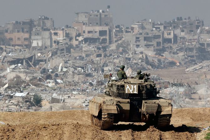 An Israeli tank patrols near the border with Gaza on January 19. 
