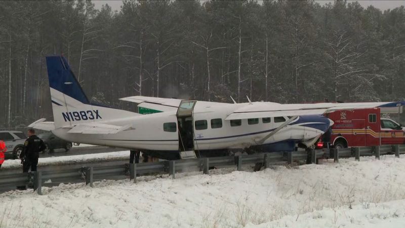 Small commuter airliner traveling from Dulles lands on road CNN