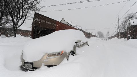 LACKAWANNA , NEW YORK - JANUARY 18: A car is abandoned  along Odell Street on January 18, 2024 in Lackawanna, New York. The suburb of Buffalo was one of the areas hit the hardest by a lake-effect snowstorm that dumped as much as 65 inches of snow over a 24-hour period this week. (Photo by John Normile/Getty Images)