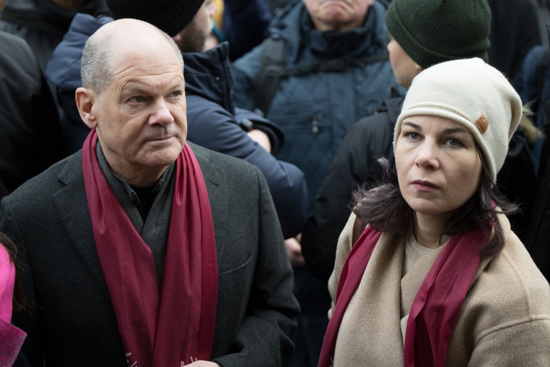 14 January 2024, Brandenburg, Potsdam: Federal Chancellor Olaf Scholz (SPD) and Annalena Baerbock (Alliance 90/The Greens), Foreign Minister, stand on the Alter Markt during the "Potsdam defends itself" demonstrations. The demonstration is a reaction to the discovery of a meeting of right-wing activists in the city. Photo: Sebastian Christoph Gollnow/dpa (Photo by Sebastian Christoph Gollnow/picture alliance via Getty Images)