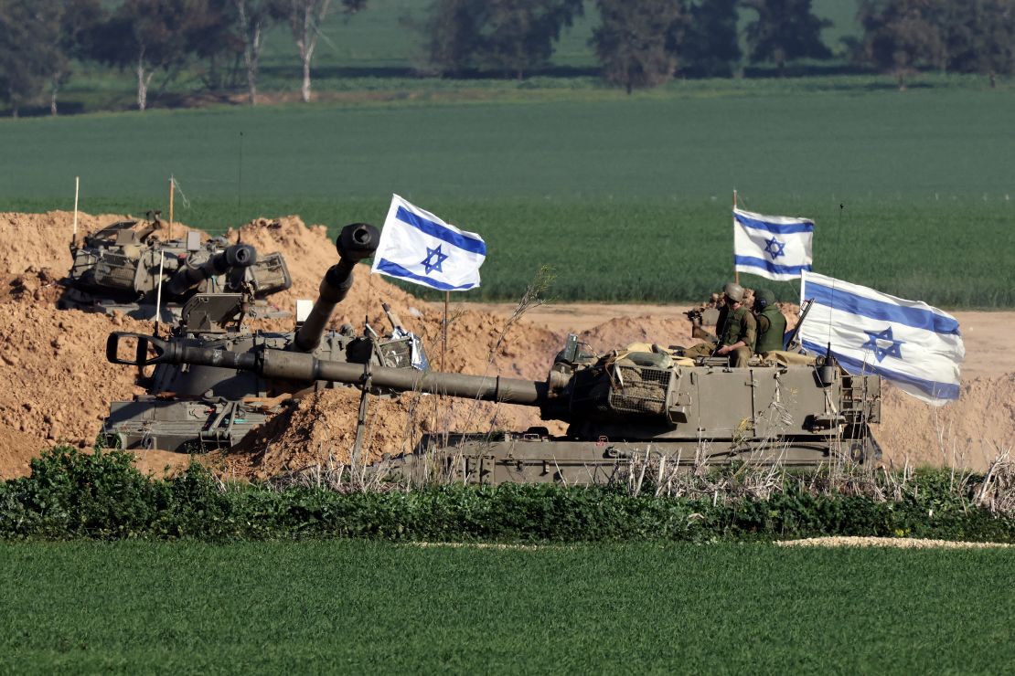 Israeli army self-propelled artillery Howitzers roll in southern Israel along the border with the Gaza Strip on January 19, 2024 amid ongoing battles between Israel and the Palestinian militant group Hamas.