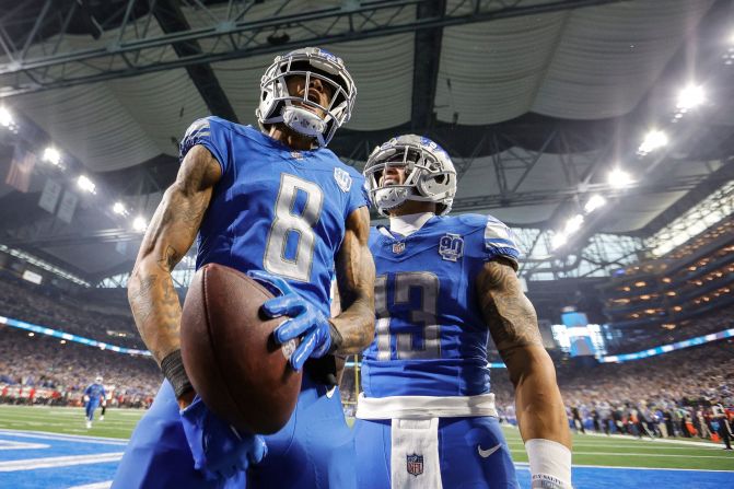Detroit Lions wide receiver Josh Reynolds, left, celebrates a touchdown with running back Craig Reynolds during the Lions' game against the Tampa Bay Buccaneers on Sunday, January 21, at Ford Field in Detroit. The Lions won 31-23.