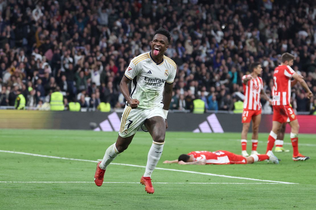 TOPSHOT - Real Madrid's Brazilian forward #07 Vinicius Junior celebrates scoring his team's second goal during the Spanish League football match between Real Madrid CF and UD Almeria at the Santiago Bernabeu stadium in Madrid on January 21, 2024. (Photo by Pierre-Philippe MARCOU / AFP) (Photo by PIERRE-PHILIPPE MARCOU/AFP via Getty Images)