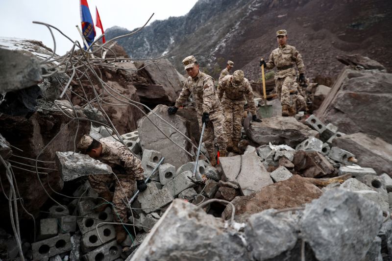 China Landslide Death Toll Rises To 31 After Dozens Buried In Freezing ...